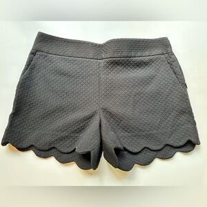 Loft black dress shorts with scalloped hem. Size 4.